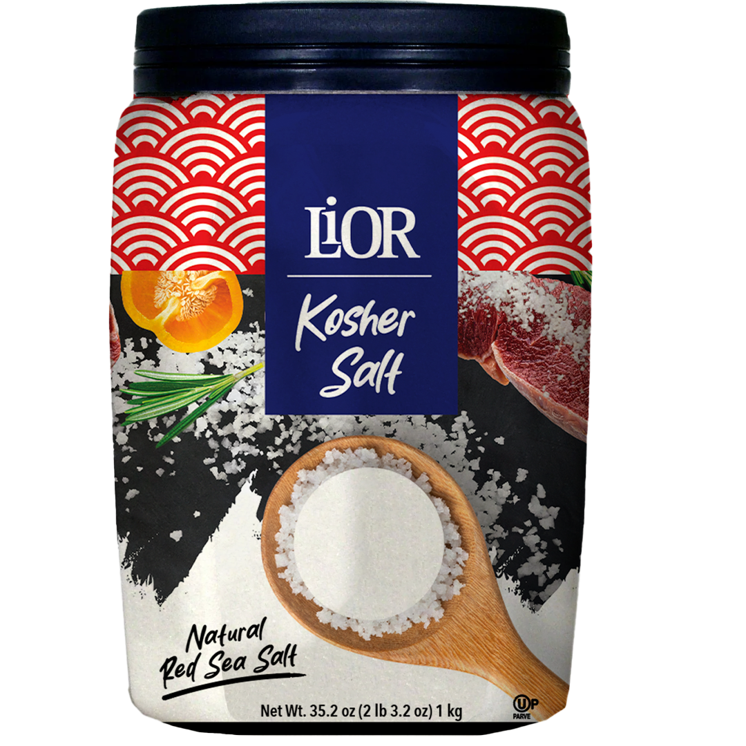 Lior Kosher Salt container with Red Sea salt, wooden scoop, and food images on black and white background.